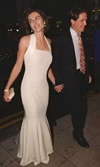 Images Dated 12th July 1994: Elizabeth Hurley Actress and boyfriend actor Hugh Grant at the premiere of new film