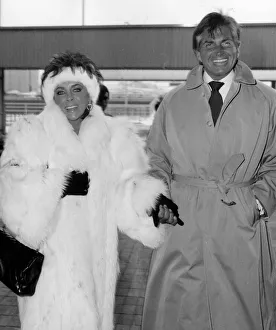 Elizabeth Taylor actress and George Hamilton at Heathrow Airport leaving for New York Elizabeth Taylor actress and George Hamilton at Heathrow Airport leaving for New York