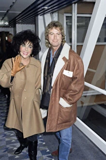 00136 Gallery: Elizabeth Taylor actress with her husband Larry Fortensky arriving at Heathrow airport