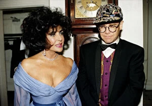 Elizabeth Taylor and Elton John together at a charity function for AIDS at Lodons