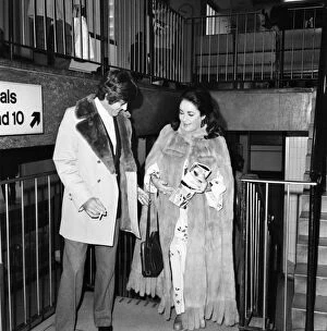 Elizabeth Taylor with Henry Wynberg seen here arriving at Heathrow Airport