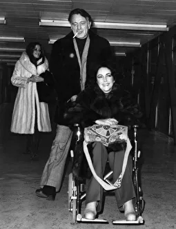 Elizabeth Taylor and Richard Burton Pictured at Heathrow Airport. December 1975 Elizabeth Taylor and Richard Burton Pictured at Heathrow Airport. December 1975