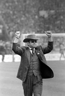 Images Dated 19th May 1984: Elton John chairman of Watford on Wembley pitch 1984 before kick off of FA cup