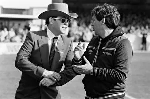Images Dated 14th May 1983: Elton John and Graham Taylor at the Watford v Liverpool football match, 14th May 1983