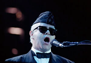 Images Dated 23rd March 1989: Elton John performing in concert in Paris during his Reg Strikes Back Tour