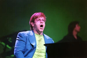 Images Dated 12th December 1997: Elton John performs in concert at the Newcastle Arena 12 December 1997