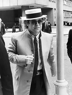 Elton John Pop singer arriving at court. 18th June 1985 Elton John Pop singer arriving at court. 18th June 1985