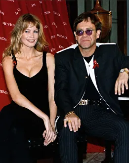 Elton John singer with Claudia Schiffer model Elton John singer with Claudia Schiffer model