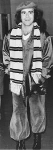 Images Dated 21st May 1979: Elton John superstar leaving Heathrow for a series of concerts in Moscow