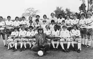 Elton John superstar and members of the England football team pose with schoolchildren in Elton John superstar and members of the England football team pose with schoolchildren in