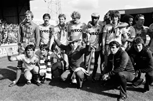 Images Dated 14th May 1983: Elton John and the Watford side pose for the photographers after their match against