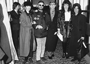 Elton John with wife and friends including Ringo Starr about to board Concorde