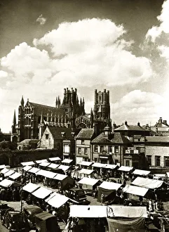 Core13 Gallery: Ely Cathedral Cambridgeshire over looking the town square on a market day