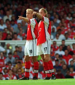 Emmanuel Petit and Dennis Bergkamp pointing August 1998 during the Arsenal v Emmanuel Petit and Dennis Bergkamp pointing August 1998 during the Arsenal v