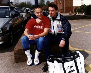Images Dated 30th April 1991: England footballer Dennis Wise Football with manager Graham Taylor before their departure
