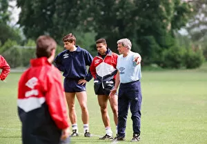 England manager Bobby Robson with Alan Smith (left) and Des Walker as he takes charge of