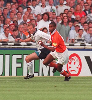 Englands Alan Shearer and Hollands Winston Bogarde battle for the ball during the England Englands Alan Shearer and Hollands Winston Bogarde battle for the ball during the England