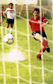 Englands Peter Beardsley scores from a penalty during a training session before