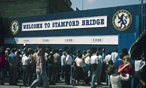 English League Division One match at Stamford Bridge. Chelsea fans make their way English League Division One match at Stamford Bridge. Chelsea fans make their way