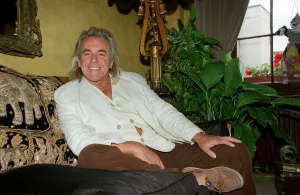 English nightclub owner Peter Stringfellow at home relaxing. September 1998 English nightclub owner Peter Stringfellow at home relaxing. September 1998
