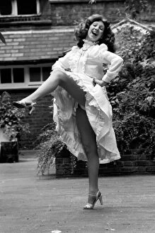 Entertainment: Dancing: A woman poses as she dances the Can-Can. July 1981 81-03766-010