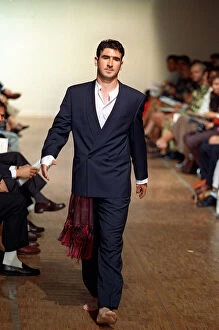 Images Dated 5th July 1993: Eric Cantona models Paco Rabanne fashion on catwalk 1993