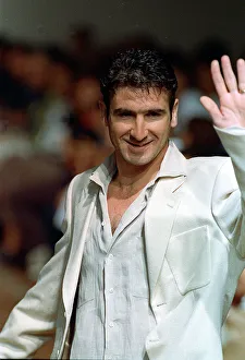 Eric Cantona models at Paco Rabanne show waving to public whilst on catwalk at the show Eric Cantona models at Paco Rabanne show waving to public whilst on catwalk at the show