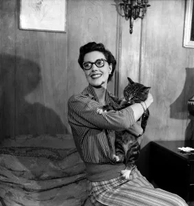 Eve Wynn. Mannequin who wears glasses and looks glamorous seen here with her pet cat Eve Wynn. Mannequin who wears glasses and looks glamorous seen here with her pet cat