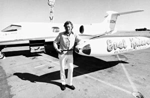 Images Dated 26th August 1974: Evel Knievel American stuntman daredevil 1974 in front of his personal plane