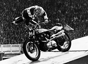 Images Dated 25th May 1975: Evel Knievel American stuntman daredevil 1975 falling off motorcycle at Wembley