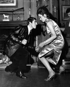 Everybody's twisting everywhere. In the fashionable 'Saddle Room" Everybody's twisting everywhere. In the fashionable 'Saddle Room"