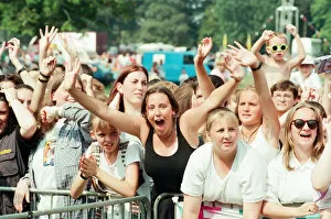 Images Dated 20th August 1995: Fans of Peter Andre, cheer as he performs at Fun Day, Stewart Park, Marton, Middlesbrough