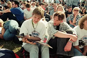 Images Dated 11th August 1996: Fans watching Oasis in concert at Knebworth, Hertfordshire. 11th August 1996