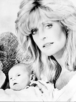 Images Dated 12th April 1985: Farrah Fawcett actress with son Redmond April 1985 dbase