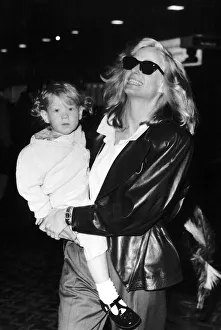 Farrah Fawcett Actress with her son Redmond leave for Los Angeles May 1987 Farrah Fawcett Actress with her son Redmond leave for Los Angeles May 1987