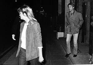 Farrah Fawcett Majors with boyfriend Ryan O'Neal 1980 walking out of Claridges