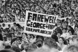 A farwell banner amongst the 1000s of fans attending Wham A farwell banner amongst the 1000s of fans attending Wham