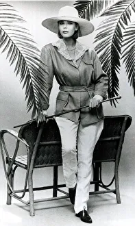 Fashion 1980s Model wearing a cotton blouse with white linen jodhpurs Fashion 1980s Model wearing a cotton blouse with white linen jodhpurs