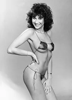 Images Dated 26th January 1984: 'Fashion - Beachwear. Sweet sue. Sunbathing is a picnic for Susan Sinclair