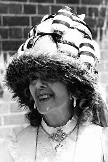 Fashionable racegoer in bee hat at Royal Ascot in June 1983