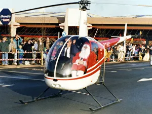 Father Christmas arriving in style, in a helicopter at the car park of Homestyle by FADS Father Christmas arriving in style, in a helicopter at the car park of Homestyle by FADS