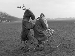 Father Christmas and his Rudolf the Reindeer - bike stunt A©Mirrorpix circa 1980 Father Christmas and his Rudolf the Reindeer - bike stunt A©Mirrorpix circa 1980