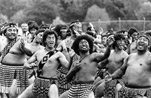 Images Dated 26th February 1977: Fearsome Maori warriors put on a traditional dance to welcome Queen Elizabeth II of