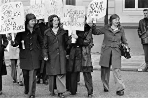 Images Dated 1st February 1975: Female football player, Edna Neillis, leads a protest march through Glasgow protesting