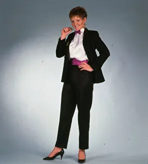Female wearing black suit November 1986 Model wearing white shirt Female wearing black suit November 1986 Model wearing white shirt