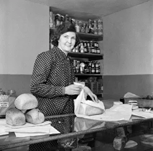 A female worker in a shop in Downe. Which is a village in Greater London within A female worker in a shop in Downe. Which is a village in Greater London within