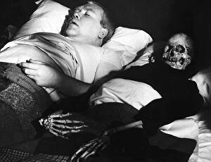 Images Dated 25th March 1971: Films Under Milk Wood starring in a scene is actor Ray Smith with his skeleton wife in