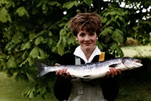 00137 Gallery: Fiona Armstrong ITN TV Presenter and News reader holding a fish May 1991