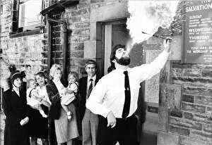 Images Dated 1st June 1985: Fire-eater Salvation Army Lt Iain Martin June 1985 demonstrates his talents as a