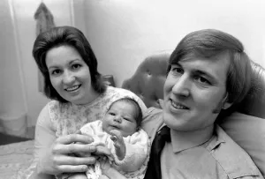 Fireman Sandy Durnall and Mrs Ann Murray and baby David John. January 1975 75-00152 Fireman Sandy Durnall and Mrs Ann Murray and baby David John. January 1975 75-00152